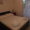 Apartments and rooms Komiža 14527, Komiža - Double room 2 with Terrace -  