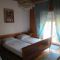 Pokoje Starigrad 14856, Starigrad - Dvoulůžkový pokoj 1 s manželskou postelí a balkónem -  