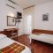 Apartmány a pokoje Novalja 15012, Novalja - Dvoulůžkový pokoj 1 s manželskou postelí a balkónem -  
