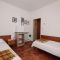 Apartmány a pokoje Novalja 15012, Novalja - Dvoulůžkový pokoj 1 s manželskou postelí a balkónem -  