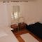 Pokoje Makarska 15155, Makarska - Dvoulůžkový pokoj 1 s manželskou postelí a terasou -  
