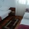 Sobe Banjol 15331, Banjol - Dvokrevetna soba 1 s bračnim krevetom, terasom i pogledom na more -  