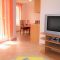 Apartmani Baška 20656, Baška - Apartman b (4+1) -  