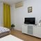 Apartments and rooms Palit 21470, Palit - Apartment - studio b (0+4) -  