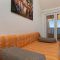 Apartments and rooms Stanići 21545, Stanići - Apartment a (4+1) -  