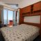 Apartmány a pokoje Podgora 3684, Podgora - Dvoulůžkový pokoj 2 s manželskou postelí, balkonem a výhledem na moře -  