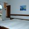 Pokoje Veli Lošinj 3996, Veli Lošinj - Dvoulůžkový pokoj 1 s manželskou postelí a terasou -  