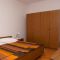 Rooms Mulobedanj 4146, Mulobedanj (Lun) - Quadruple Room 1 with Balcony and Sea View -  