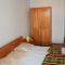 Pokoje Jakišnica 4159, Jakišnica - Dvoulůžkový pokoj 3 s manželskou postelí, terasou a výhledem na moře -  