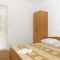 Pokoje Mandre 4204, Mandre - Dvoulůžkový pokoj 1 s manželskou postelí, balkonem a výhledem na moře -  