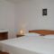 Sobe Korčula 4441, Korčula - Dvokrevetna soba 1 s bračnim krevetom, terasom i pogledom na more -  