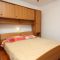 Pokoje Pomena 4889, Pomena - Dvoulůžkový pokoj 1 s manželskou postelí, terasou a výhledem na moře -  
