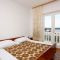 Pokoje Barbat 4944, Barbat - Dvoulůžkový pokoj 4 s manželskou postelí, balkonem a výhledem na moře -  