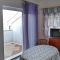 Apartments and rooms Njivice 5343, Njivice - Apartment 3 with Terrace and Sea View -  