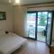 Ferienwohnungen Njivice 5358, Njivice - Apartment 1 mit Terrasse und Meerblick -  