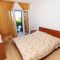 Апартаменты и комнаты Supetar 5526, Supetar - Двухместный номер 2 с 1 кроватью и балконом -  