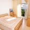 Ferienwohnungen und Zimmer Supetar 5526, Supetar - Doppelzimmer 3 mit Balkon und Meerblick -  