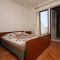 Apartmány a pokoje Povljana 6053, Povljana - Dvoulůžkový pokoj 1 s manželskou postelí, terasou a výhledem na moře -  