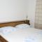 Pokoje Makarska 6548, Makarska - Dvoulůžkový pokoj 1 s manželskou postelí, balkonem a výhledem na moře -  
