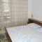 Pokoje Makarska 6548, Makarska - Dvoulůžkový pokoj 3 s manželskou postelí, balkonem a výhledem na moře -  