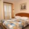 Ferienwohnungen und Zimmer Seget Vranjica 6614, Seget Vranjica - Doppelzimmer 4 mit Balkon und Meerblick -  