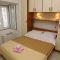 Pokoje Žuljana 6633, Žuljana - Dvoulůžkový pokoj 2 s manželskou postelí, terasou a výhledem na moře -  