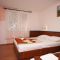 Комнаты Drašnice 6711, Drašnice - Двухместный номер 4 с 1 двуспальной кроватью и дополнительной кроватью -  
