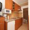 Apartments Novalja 6956, Novalja - Apartment 2 with Terrace -  