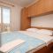Apartments Novalja 7036, Novalja - Three-Bedroom Apartment 1 -  