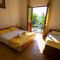 Pokoje Starigrad 7053, Starigrad - Dvoulůžkový pokoj 4 s manželskou postelí, balkonem a výhledem na moře -  