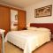 Apartmanok és szobák Rovinj 7385, Rovinj - Szoba kétszemélyes ággyal 1 -  terasszal és kilátással a tengerre -  