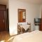 Apartmanok és szobák Rovinj 7385, Rovinj - Szoba kétszemélyes ággyal 1 -  terasszal és kilátással a tengerre -  