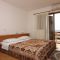 Pokoje Ičići 7952, Ičići - Dvoulůžkový pokoj 1 s manželskou postelí, balkonem a výhledem na moře -  