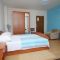 Pokoje Pašman 8223, Pašman - Dvoulůžkový pokoj 1 s manželskou postelí, balkonem a výhledem na moře -  