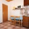 Apartments and rooms Mandre 8989, Mandre - One-Bedroom Apartment 2 -  
